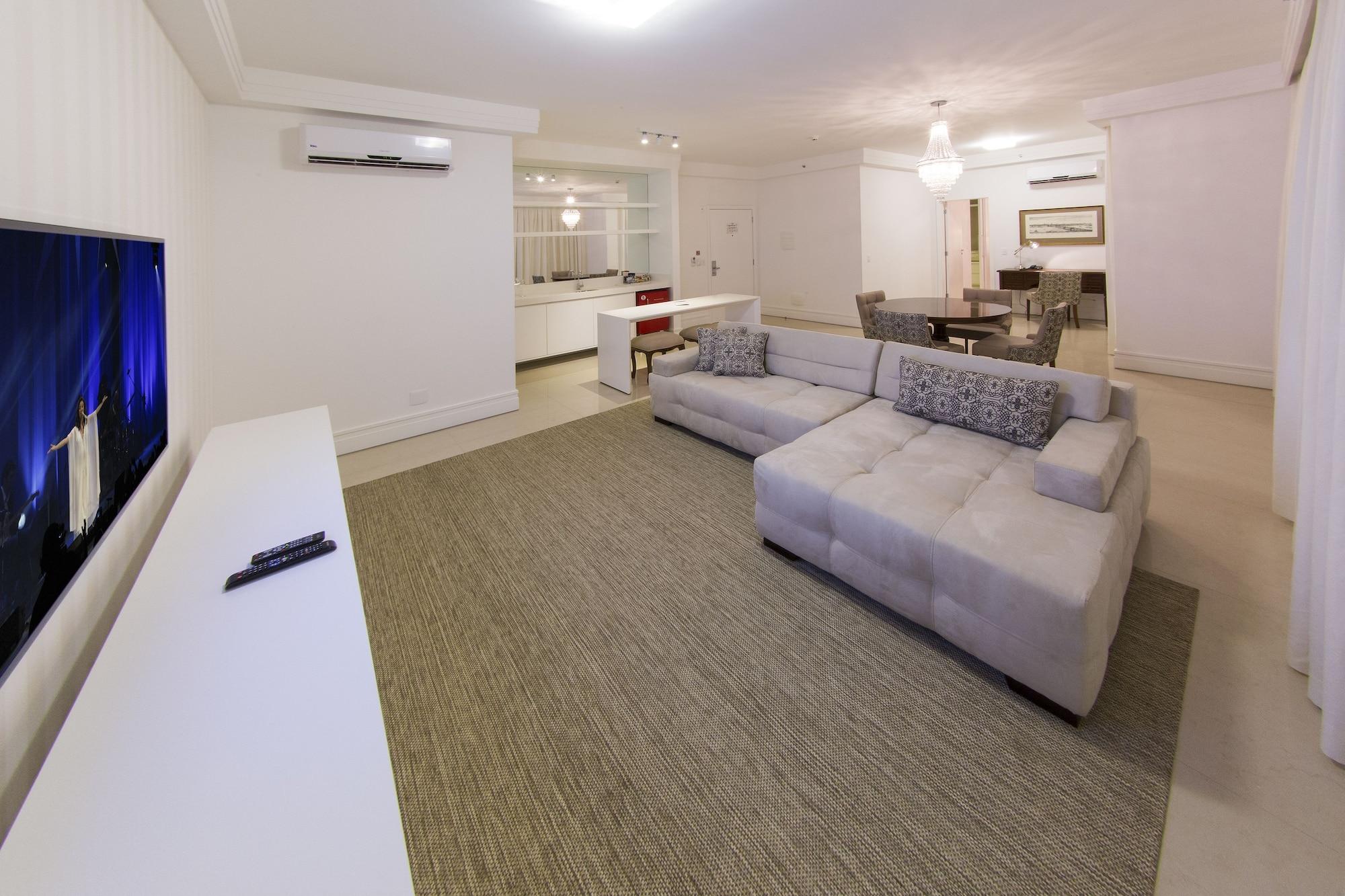 Hotel Mont Blanc Premium ريبيراو بريتو المظهر الخارجي الصورة A living room in a condominium
